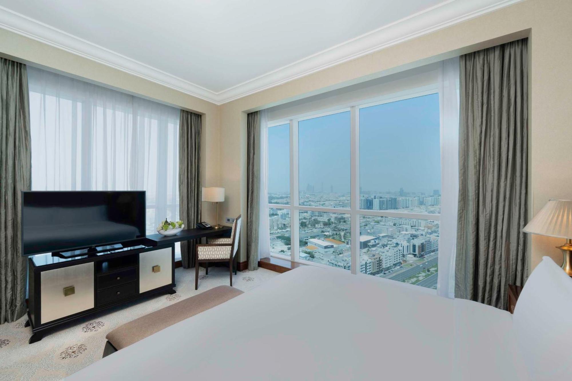 Dusit Thani Abu Dhabi Exterior photo A bedroom at the Ritz-Carlton, Bahrain